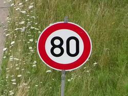 CU Shot of Speed limit sign plate on freeway A1 / Hermeskeil, Rhineland-Palatinate, Germany Stock Footage