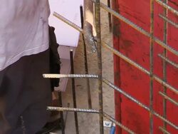 CU Shot of workmen at formwork construction at new sewage pipe / Brotdorf, Rhineland Palatinate, Germany Stock Footage