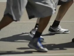 CU ECU R/F of basketball players feet as they play and dribble the basketball. Stock Footage