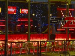 MS, Glass windows of ESPN sports zone bar at L.A. Live, night, Los Angeles, California, USA Stock Footage