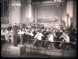 Band rehearsal in a big hall at the Paris Conservatoire, France, 1943 Stock Footage