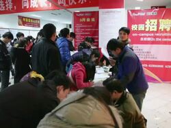 MS Job seeker filling out form at employment Fair / xi'an, shaanxi, china Stock Footage