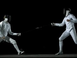HD: Fencers Practicing On Black Background Stock Footage