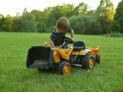 Boy with tractor Stock Footage