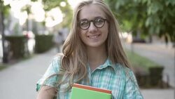 1080p Blond school girl looking at camera Stock Footage