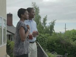 MS Couple drinking juice in balcony / Portland, Oregon, United States  Stock Footage