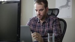 Designer Using conference call Stock Footage