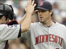 The Tigers hold a two-game lead over the Twins in the AL Central, after splitting a doubleheader with Minnesota Tuesday. The Red Sox won the AL wildcard berth, when Texas lost to the LA Angels. (Sept. 30) News Clip