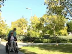 Two women pushing wheelchair 2 - HD video Stock Footage