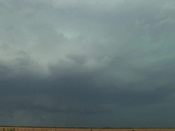 WS View of lightning strikes ground behind prairie in day / Texas, United States Stock Footage