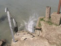 MS Wave breaking on stair / Douarnenez, Brittany, France Stock Footage