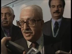 UN chief with deputy PM Tareq Aziz, comments from Aziz News Clip