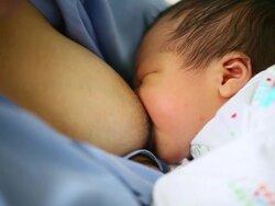breastfeeding. mother feeding her baby Stock Footage