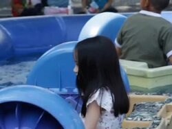 Asian little girl on the toy boat Stock Footage