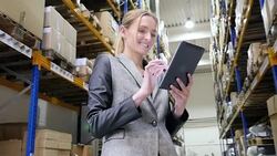 Successful attractive inspector in warehouse Stock Footage