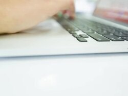 Woman using laptop computer Stock Footage