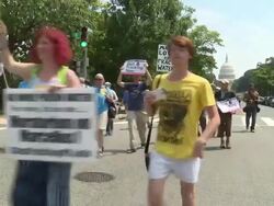 Environmentalists march, chant and hold signs against fracking, water pollution and FERC Stock Footage