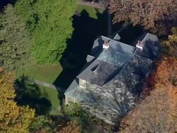 MS AERIAL ZI DS Shot of Mark Twain House surrounded by tree in city / Connecticut, United States Stock Footage