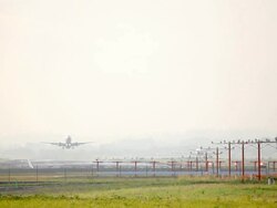 airplane take off early morning haze Stock Footage