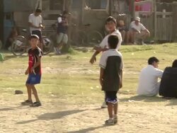 MS Shot of kids playing football on ground / Buenos Aires, Argentina Stock Footage