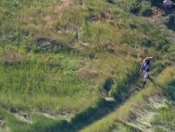 AERIAL MS POV View of woman exiting in house / Trischen, Schleswig-Holstein, Germany Stock Footage