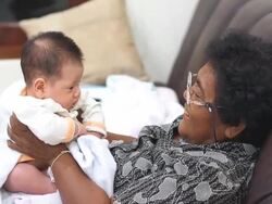 Baby and grandmother Stock Footage
