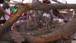 Emergency crews searched for survivors Monday in the debris left by a powerful tornado that killed at least 14 people in Arkansas and carved an 80-mile path of destruction through suburban Little Rock. (April 28) News Clip