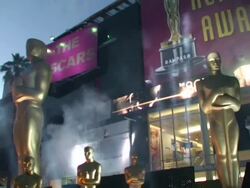 Ext. Academy Awards Lights Camera Oscar Statues Stock Footage