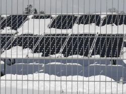 MS Shot of snow lying on solar panels, photovoltaic / Landshut, Bavaria, Germany Stock Footage
