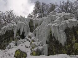 ice on rock receding, changing season Stock Footage