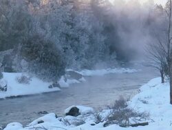WS View of Frost and mist on river in winter / Whitney, Ontario, Canada Stock Footage