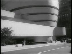 B/W 1959 people walking + taxi passing in front of Guggenheim Museum / NYC / newsreel Stock Footage