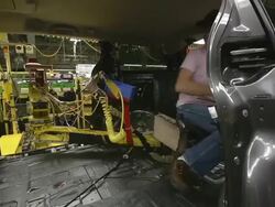 MS PAN Worker using an ergonomically designed sled to help her moving inside mini van / Princeton, Indiana, United States Stock Footage