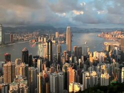 High angle view from Victoria Peak, Mount Austin,, Hong Kong Island, looking across harbour towards Kowloon Stock Footage