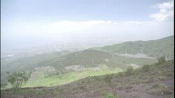 Low clouds gather over rolling hills in Naples, Italy. Stock Footage