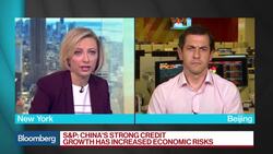 S&P Downgrades China to A+ From AA- News Clip