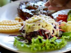 HD:Eating steak and salad. Stock Footage