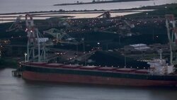 McDuffie Coal Terminal with cranes and ship on Mobile River in Alabama. Stock Footage