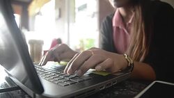 Typing on a Notebook Stock Footage