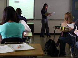 High School students learn from teacher and interactive whiteboard. Stock Footage