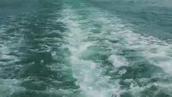 A BOTTOM ANGLE SHOT OF WAVES FORMED BY A BOAT Stock Footage