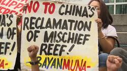 Small protest against China's presence on reef News Clip