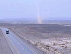 Aerial road and dust devil in Negev Desert, Negev, Israel Stock Footage