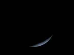 Cu Moon or lunar eclipse, mostly obscured, only a sliver of moon visible Stock Footage