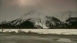 Snow covers mountains in Alaska. Stock Footage