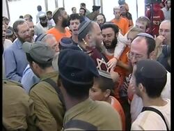 WRAP Settlers leaving with Torah scrolls News Clip