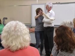 HD: First Aid Instructor Making An Arm Sling Stock Footage