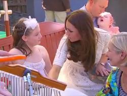 Duchess speaks to children during music therapy News Clip