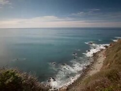 WS  T/L  Waves hiting on rocks and clouds moving in blue sky / Big Sur, California, United States Stock Footage