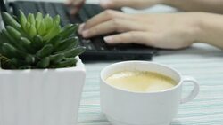 TypingAndDrinking Stock Footage